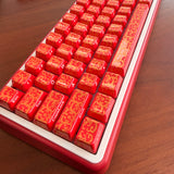 High-temperature fired red gold-patterned ceramic keycaps